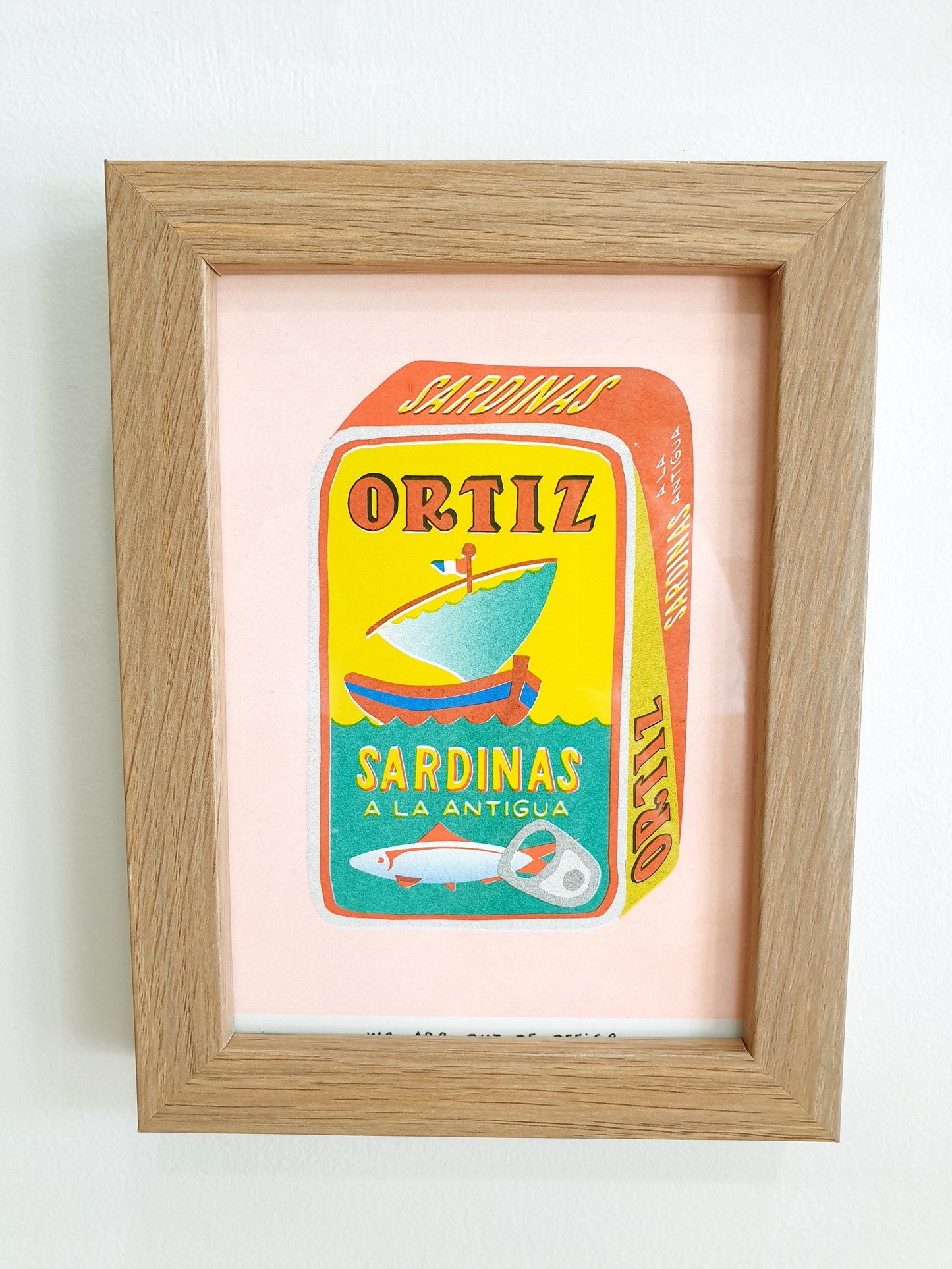 'A can full of sardines' - A framed risograph print.