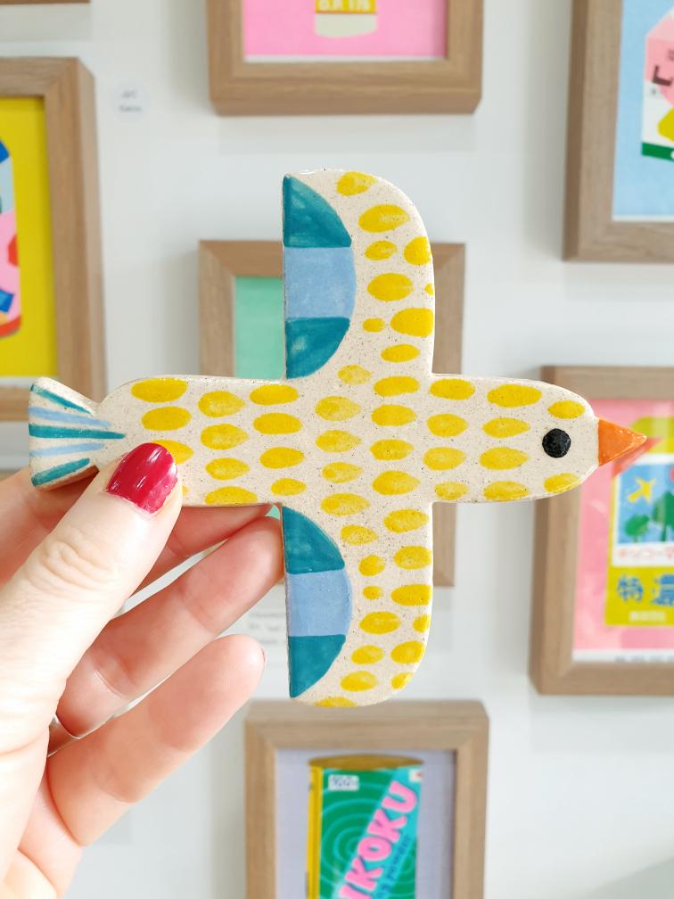 Yellow Ceramic Bird wall hanging