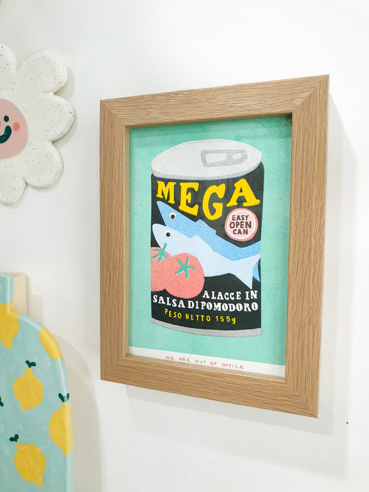'A can of MEGA sardines' - A framed risograph print.
